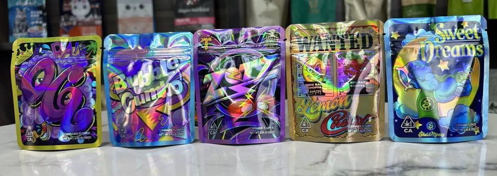 Holographic printed tobacco pouches showing print registration and clear film edges